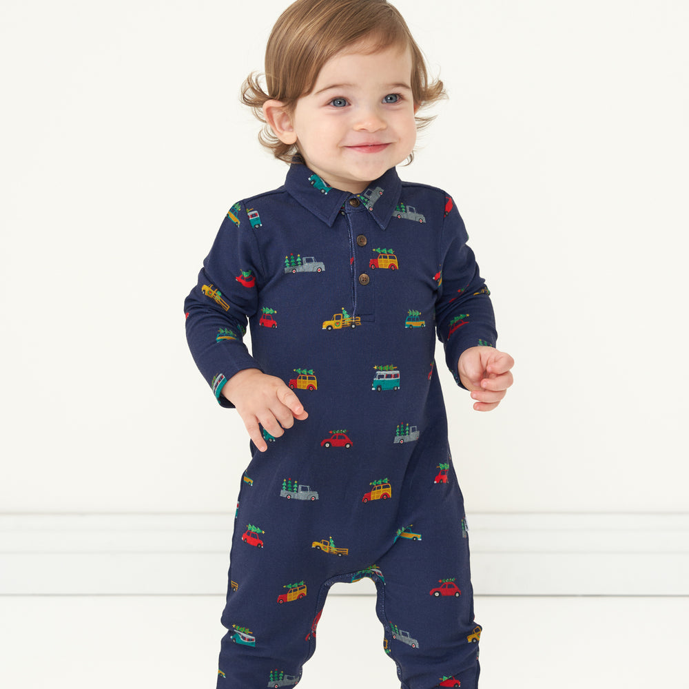 Alternate image of a child wearing a Tree Traffic polo romper