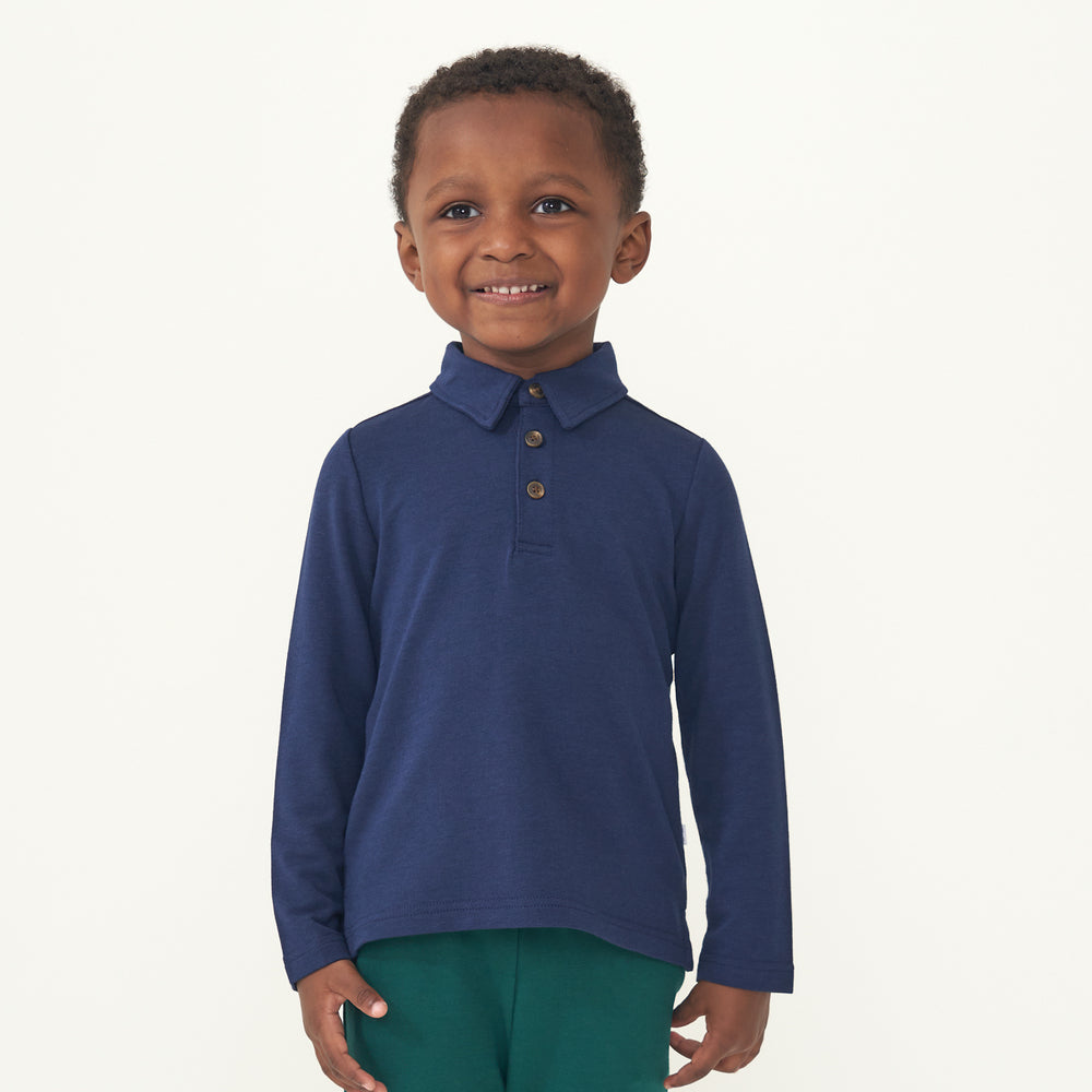 Child wearing a Classic Navy polo shirt