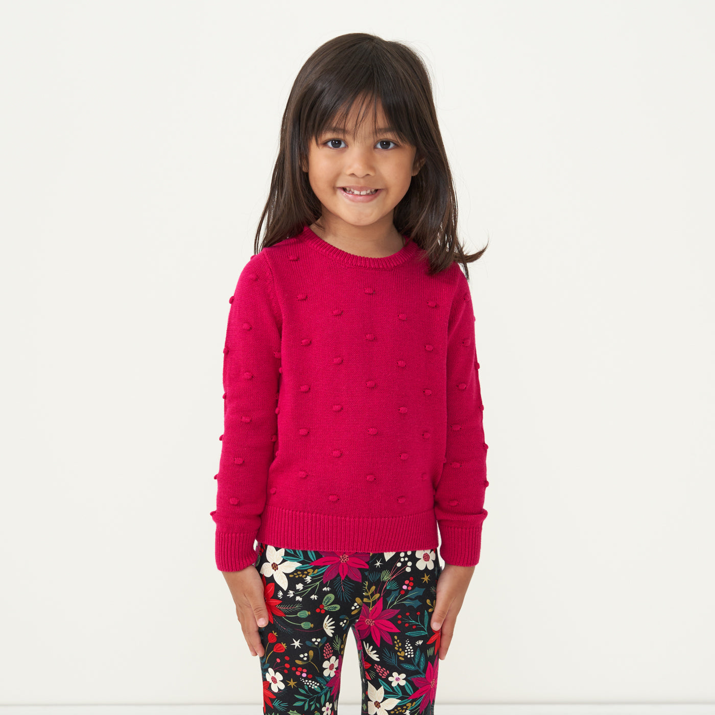 Alternate image of a child wearing Mixed Berry Pom Pom sweater paired with Merry Berry leggings