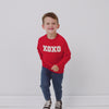 video of a child wearing an xoxo crewneck sweatshirt and coordinating bottoms