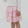 Video of a child wearing a Rosy Meadow ruffle skort and coordinating cardigan