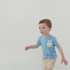 Video of a child wearing a Lake Blue pocket tee and coordinating chino shorts