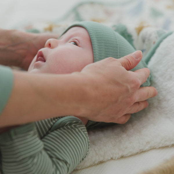 Newborn wearing the Willow Ribbed Infant Beanie