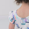 Video of a child wearing a Seas the Day flutter skater dress with bodysuit