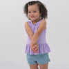 Video of a child wearing a Pastel Lilac peplum pocket tank and coordinating Play shorts