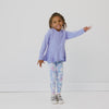 Video displaying girl posing and playing in the Light Iris Peplum Hoodie and Magical Meadows Leggings