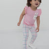 Video of a child wearing Playful Plaid leggings and a coordinating top