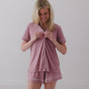 Standing woman wearing the Rosewood Women's Short Sleeve Short Bamboo Pajama Set