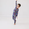 Video of a child wearing a Playful Dreidels Two-Piece Pajama Set