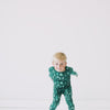 Video of children playing while wearing the Green Twinkling Trees Two-Piece Pajama Set