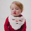 Baby wearing the Santa Bandana Bib with a red zipper pajama