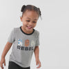 Video of children wearing a Rebel graphic tee and coordinating play bottoms