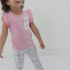 Video of a child wearing a Pink Blossom flutter pocket tee and coordinating leggings