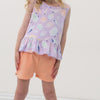 Video of a child wearing Peach Nectar dolphin shorts and a coordinating Play top