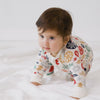 Video of children crawling, walking and playing while wearing the Modern & Merry Zippy