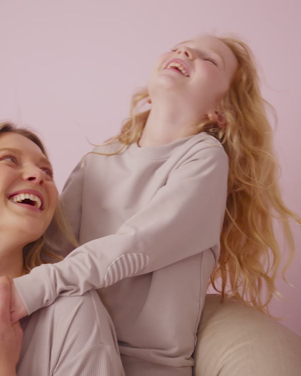 Two children wearing the Dove Gray Crewneck Sweatshirt and Joggers