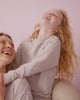 Two children wearing the Dove Gray Crewneck Sweatshirt and Joggers