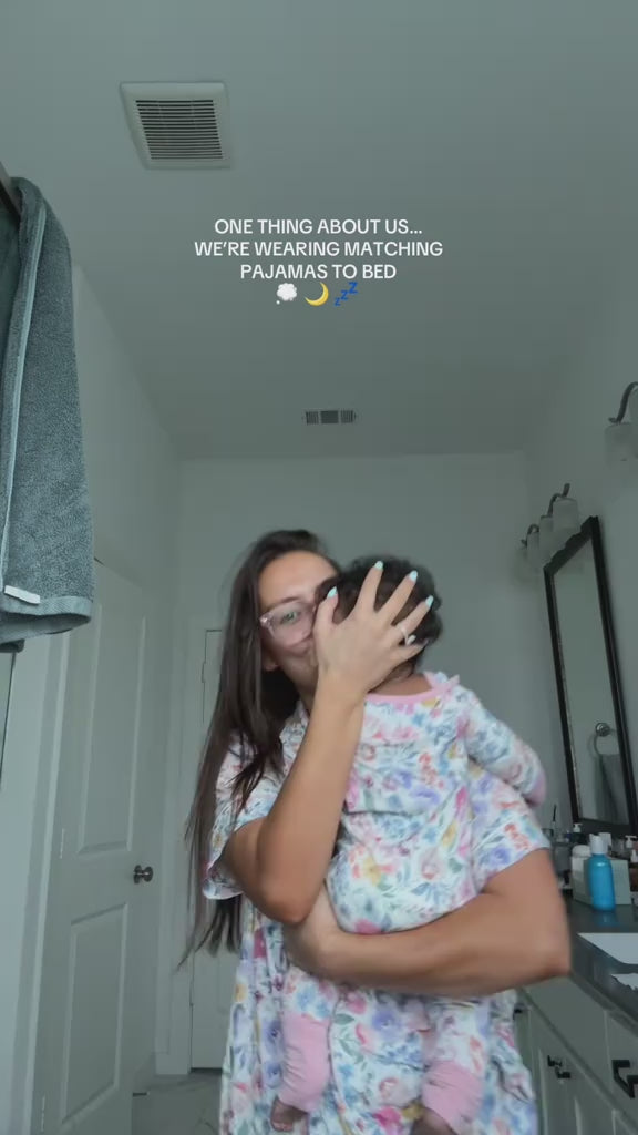 Mother and child wearing matching Tiny Blooms pajamas