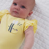 Video of children wearing a Lemon Twist Flutter Bodysuit and coordinating bottoms