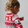 Family of three wearing matching Festive Fair Isle holiday pajamas