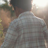 Video of boy outdoors walking on a hiking trail while wearing the Canyon Plaid Shacket