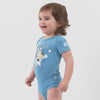 Video of a child wearing a Bluey graphic bodysuit