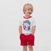 Video of children wearing a Party in the USA graphic tee and coordinating Play shorts
