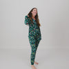 Woman wearing the Nutcracker March Women's Long Sleeve Pajama Top with coordinating pajama bottoms