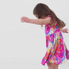 Video of children wearing a Rainbow Blooms Flutter Twirl Dress