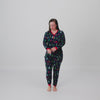 Woman wearing the Navy Tree Traffic Women's Long Sleeve Pajama Top and coordinating pj pants