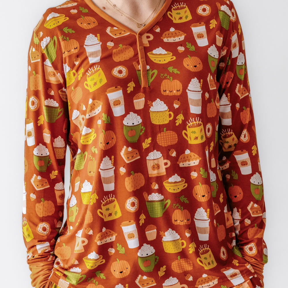 Close up image of a woman wearing a Pumpkin Spice women's pajama top