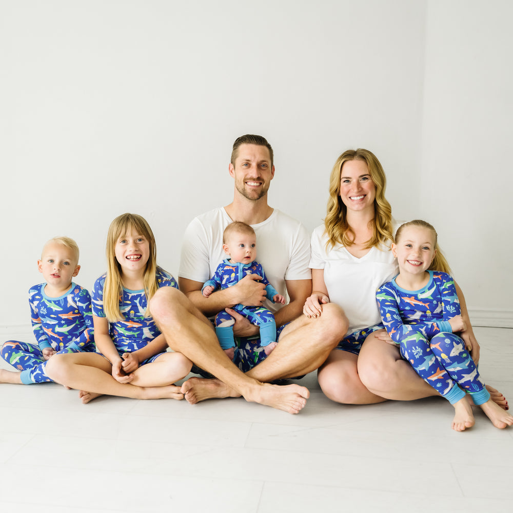 Family of six wearing matching Rad Reef pajamas