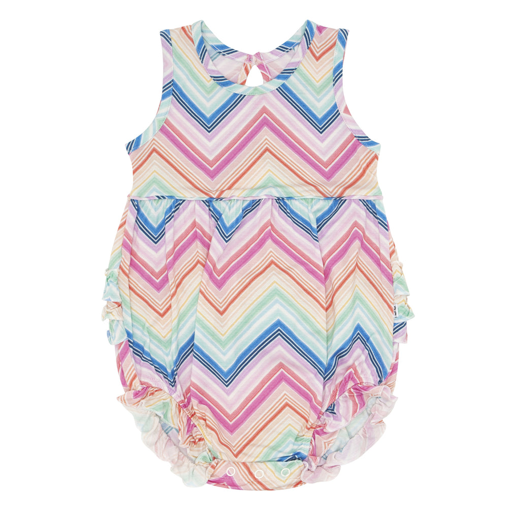 Flay lay image of a Rainbow Chevron printed bubble romper