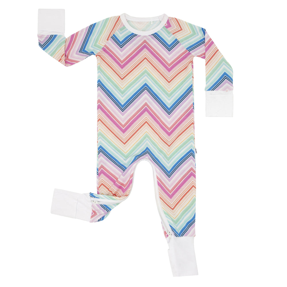 Click to see full screen - Flat lay image of a Rainbow Chevron printed crescent zippy