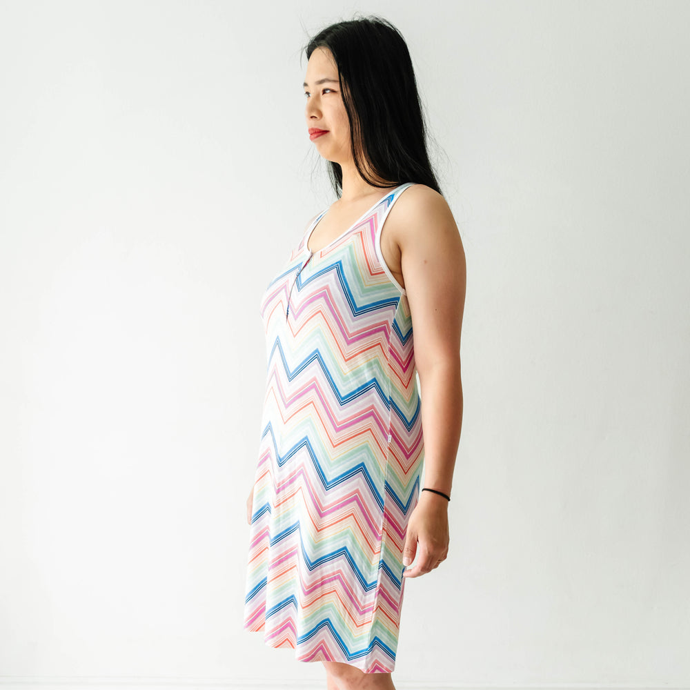 Side view of a woman wearing a Rainbow Chevron printed women's nightgown