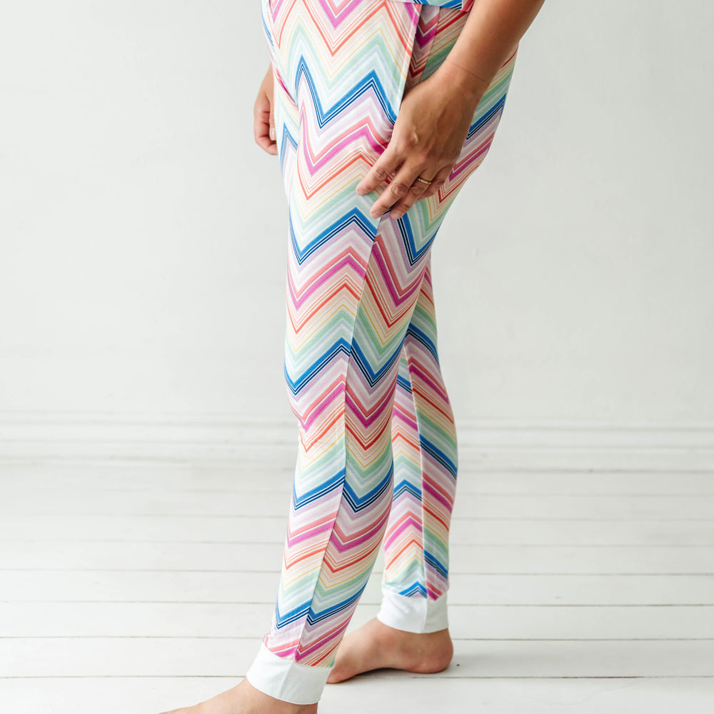 Click to see full screen - Side view image of a woman wearing Rainbow Chevron printed women's pajama pants