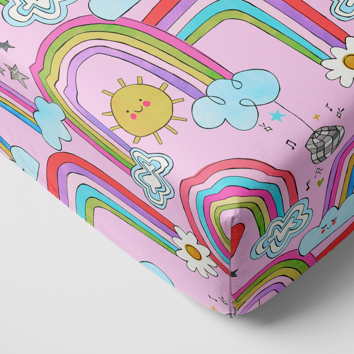 Close up of the Disco Rainbows Fitted Crib Sheet
