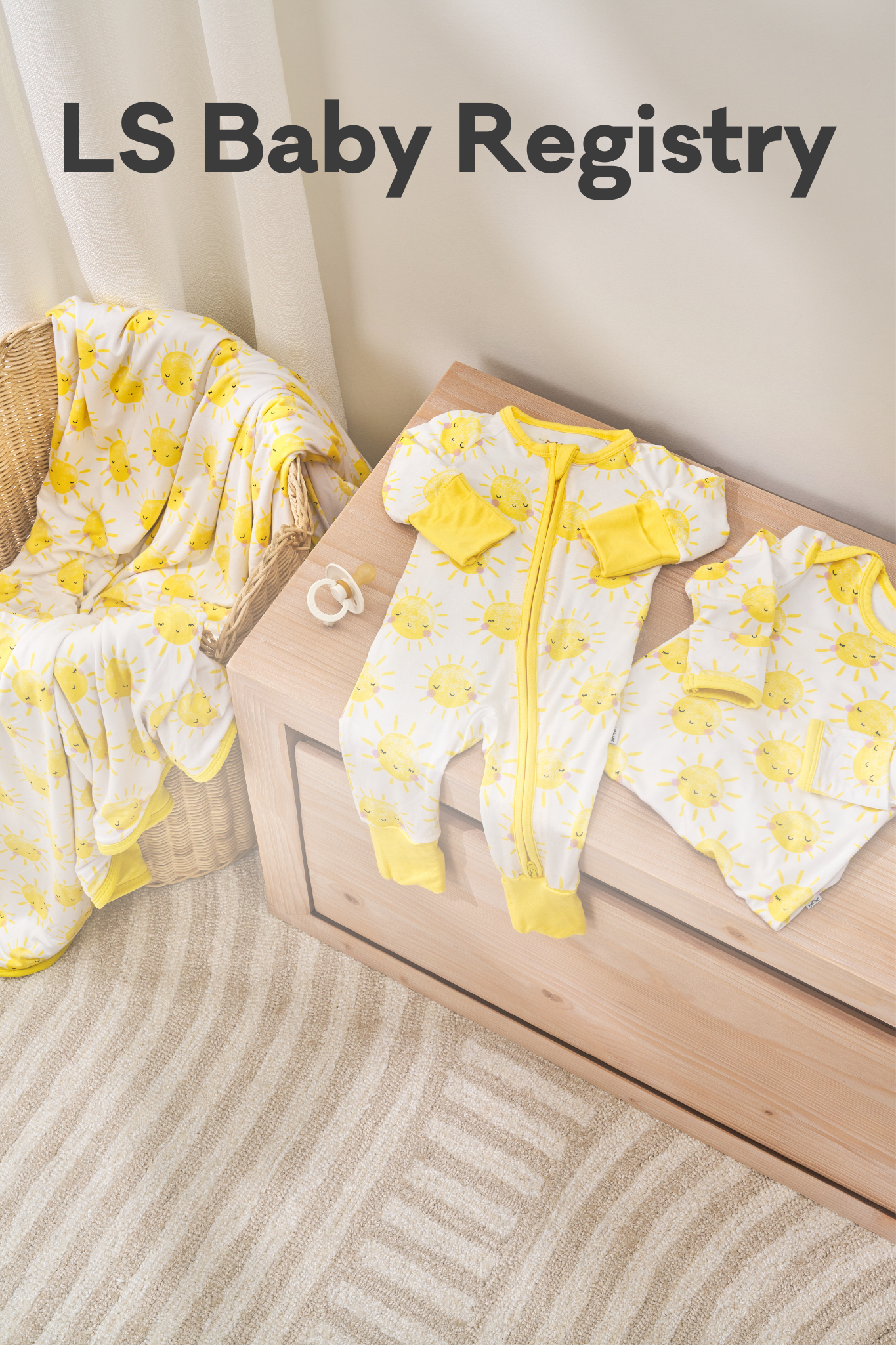 Sunshine Large Cloud Blanket, Zippy, and Infant Gown laying across a bassinet and dresser