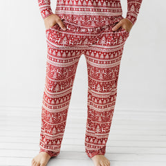 Man wearing Reindeer Cheer men's pajama pants