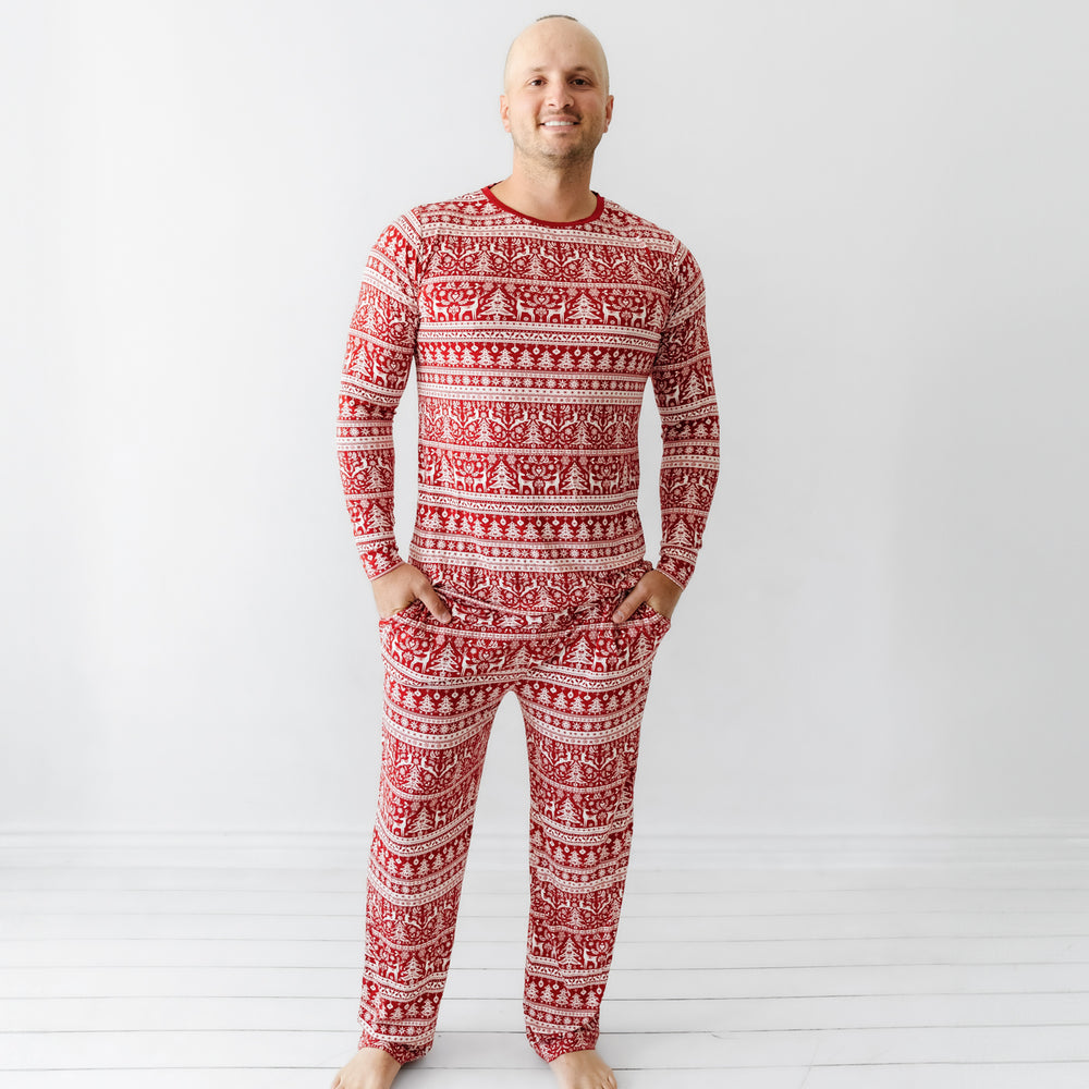 Man wearing Reindeer Cheer men's pajama pants and matching pajama top