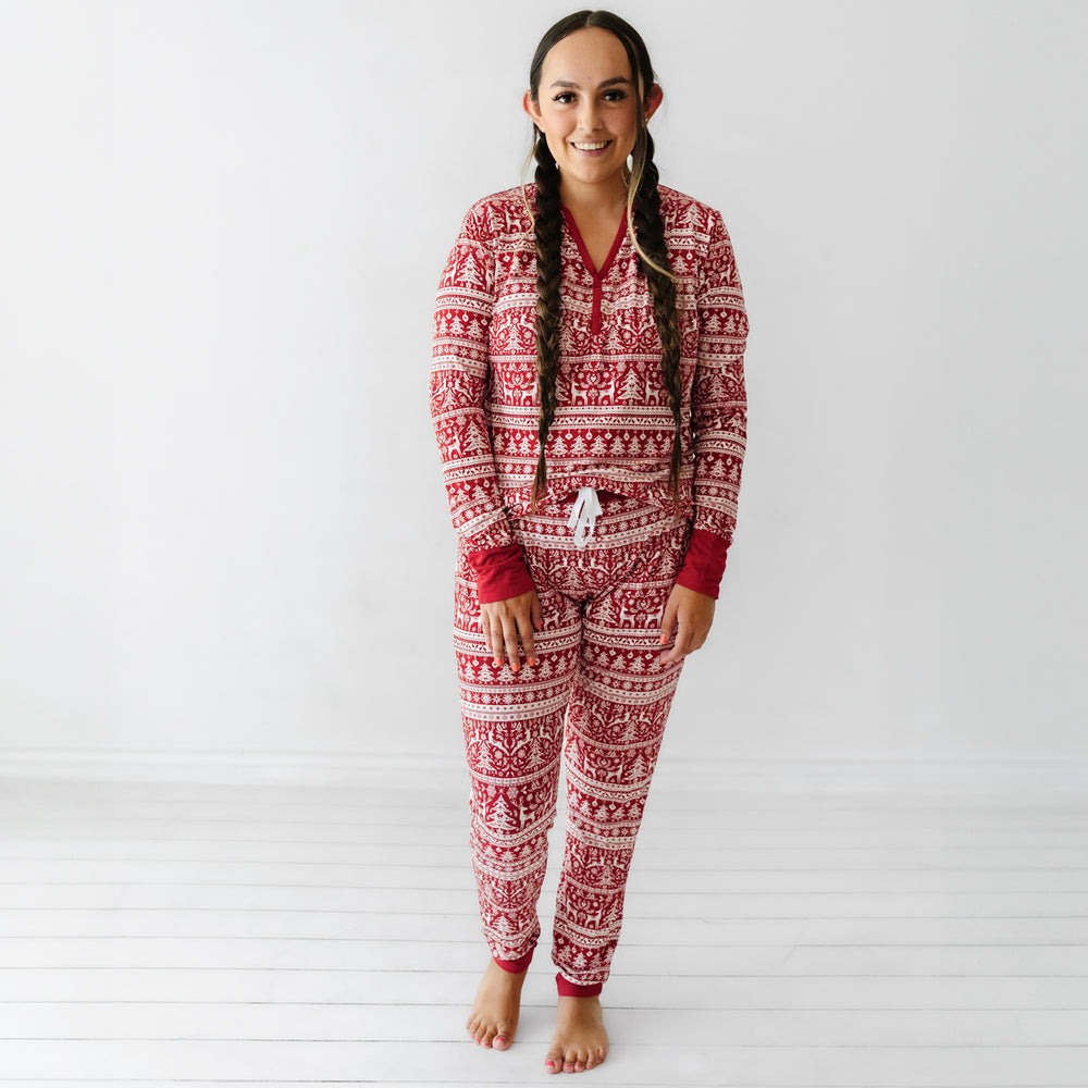 Woman wearing Reindeer Cheer women's pajama pants and matching pajama top