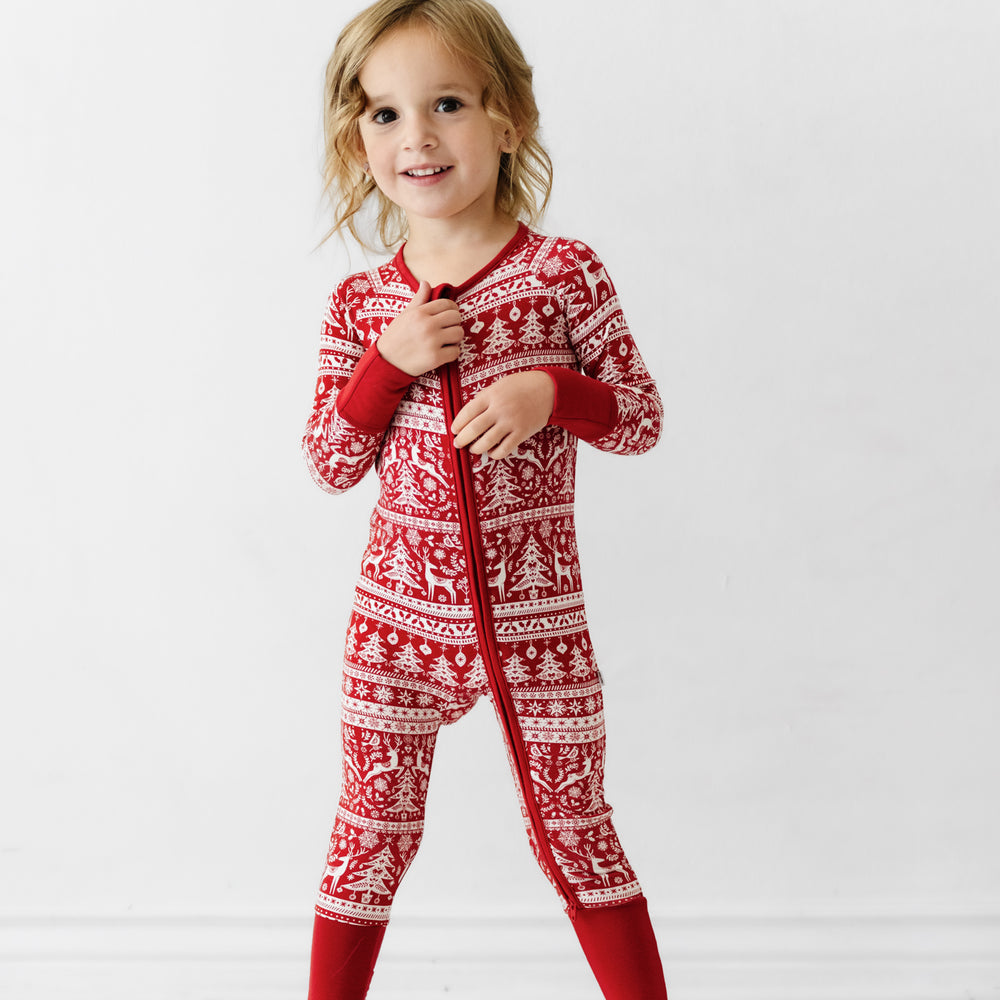 Child wearing a Reindeer Cheer zippy