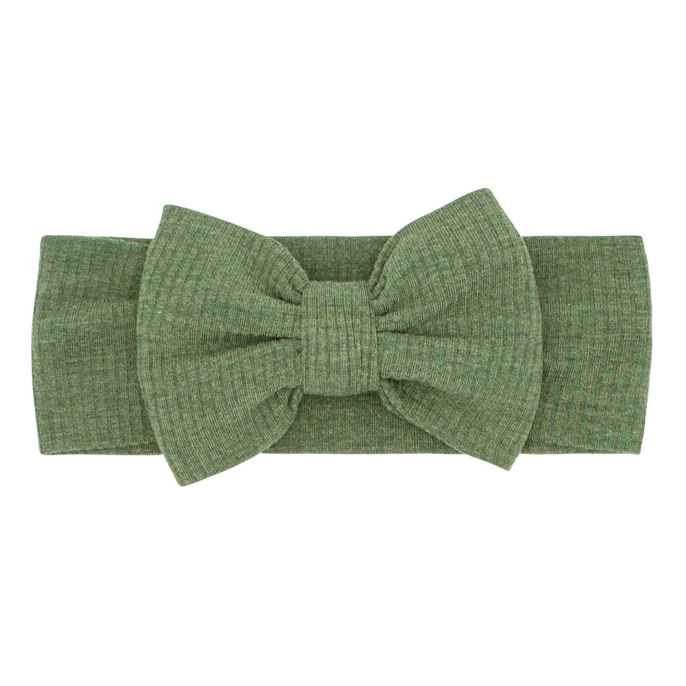 Flat lay image of a Heather Cypress Green Ribbed luxe bow headband