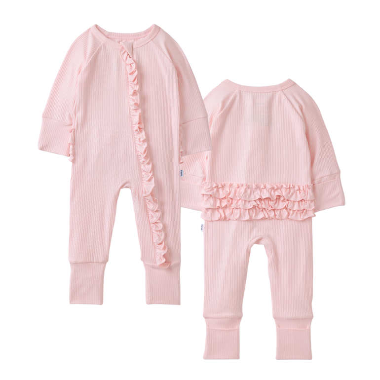 Pink baby romper with ruffled details on a white background