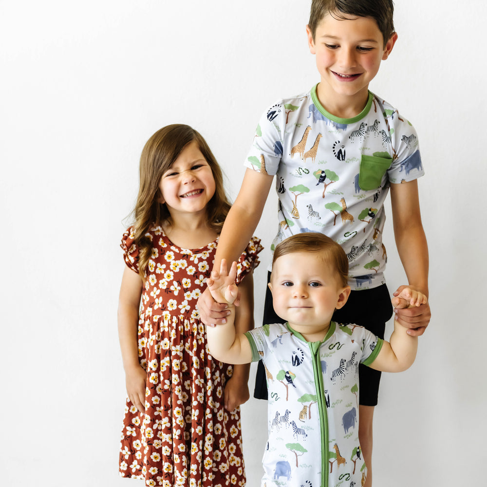 Children wearing coordinating Safari Friends and Mocha Blossom printed clothing