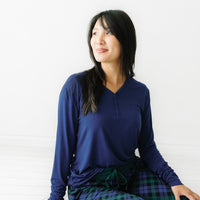 Profile view of a woman wearing a Sapphire women's pajama top