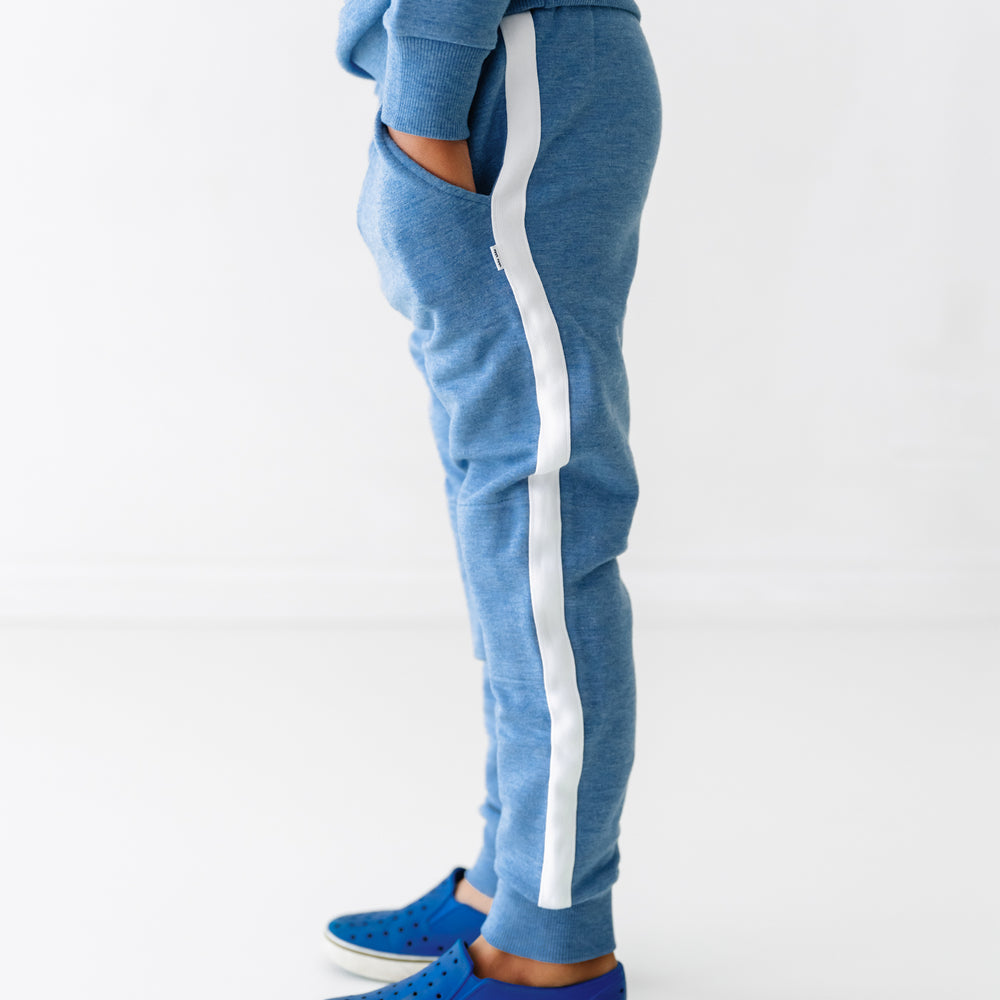 Side view image of a child wearing a Sesame Street Cookie Monster jogger