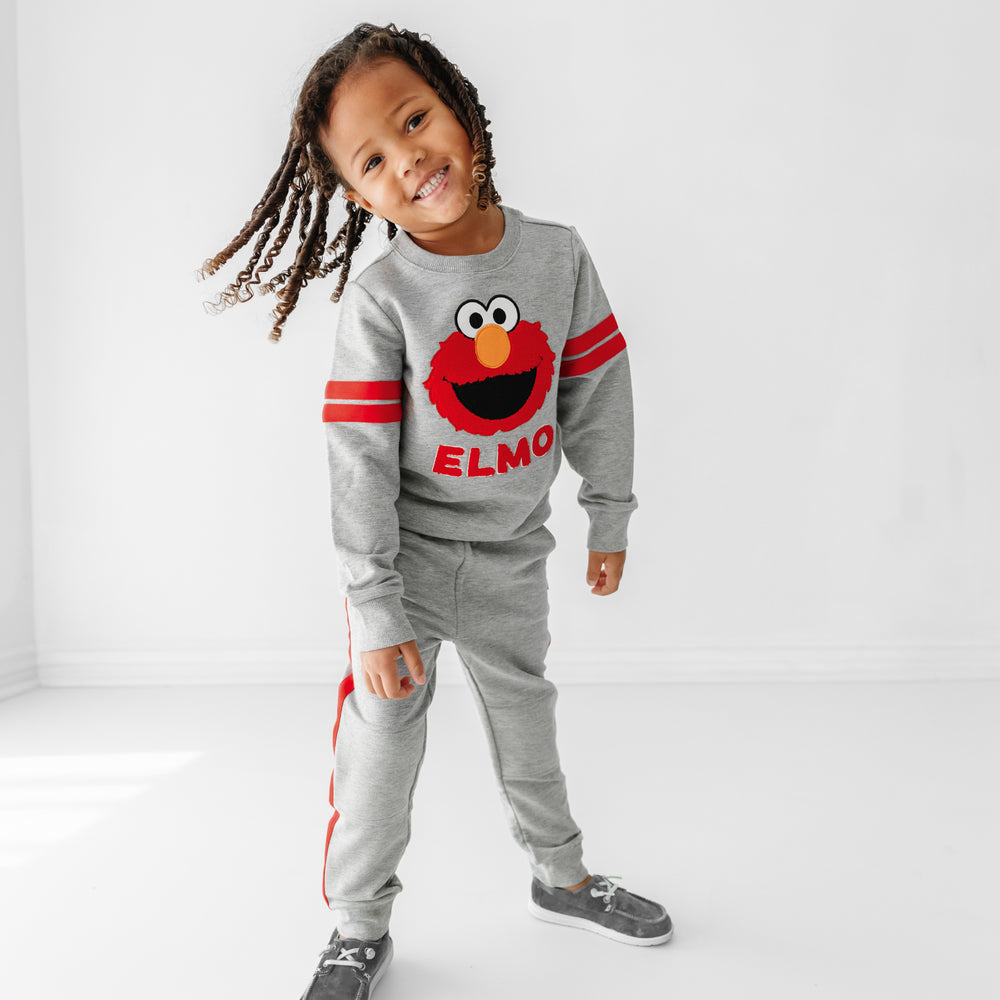 Alternate image of a child wearing a Sesame Street Elmo crewneck sweatshirt and jogger set