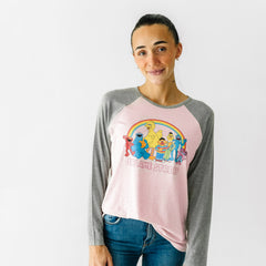 Alternate image of a woman wearing a Sesame Street pink women's raglan tee