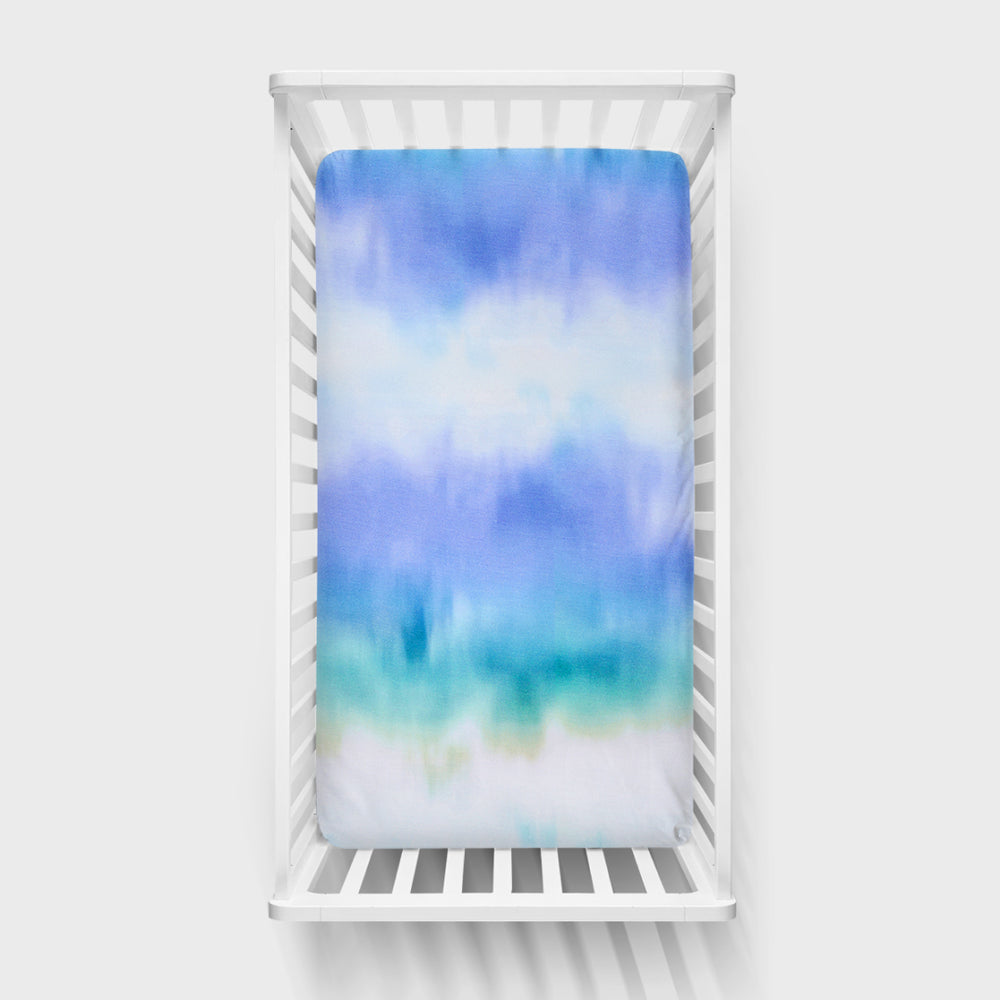 Aerial view of the Blue Cosmic Mist Fitted Crib Sheet